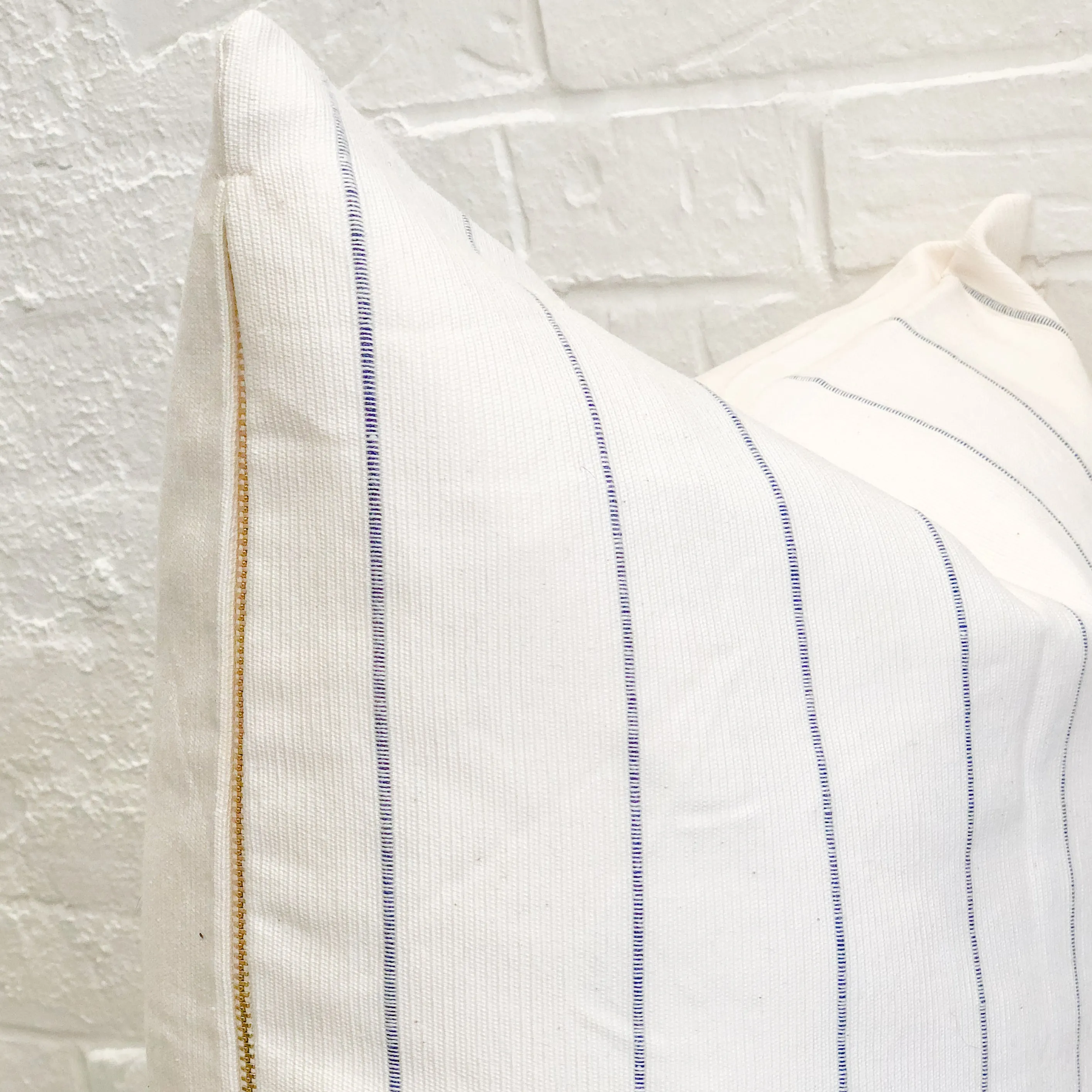 Dhalia Striped Throw Pillow in Navy Blue