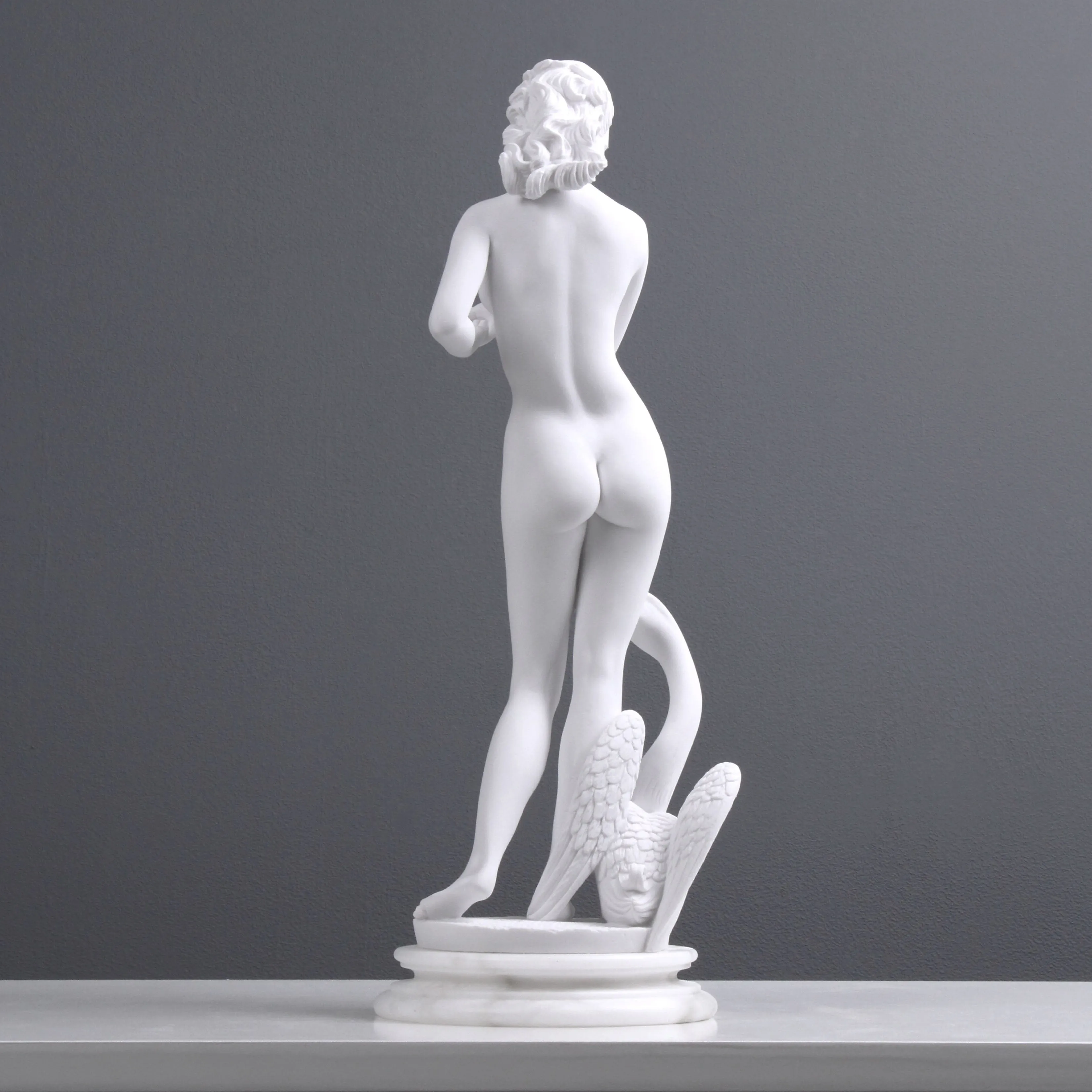 Young Lady with a Swan Statue