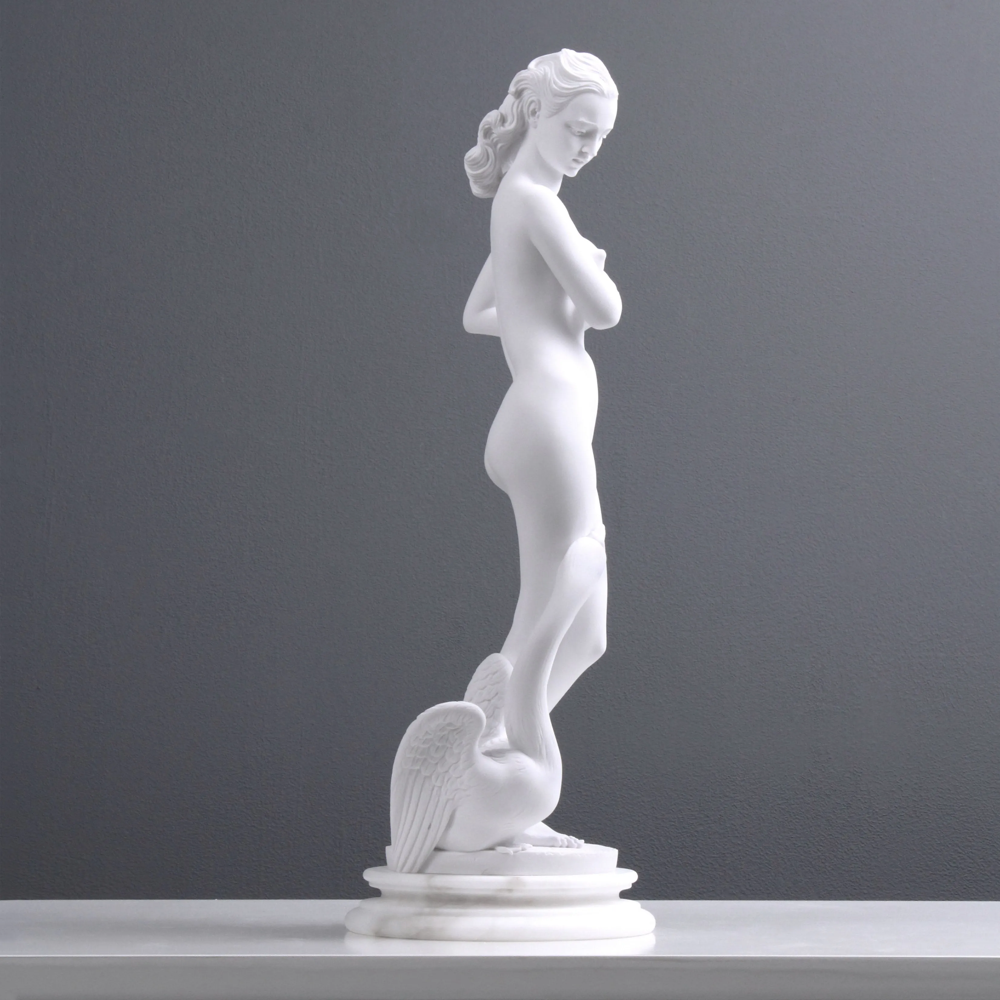 Young Lady with a Swan Statue