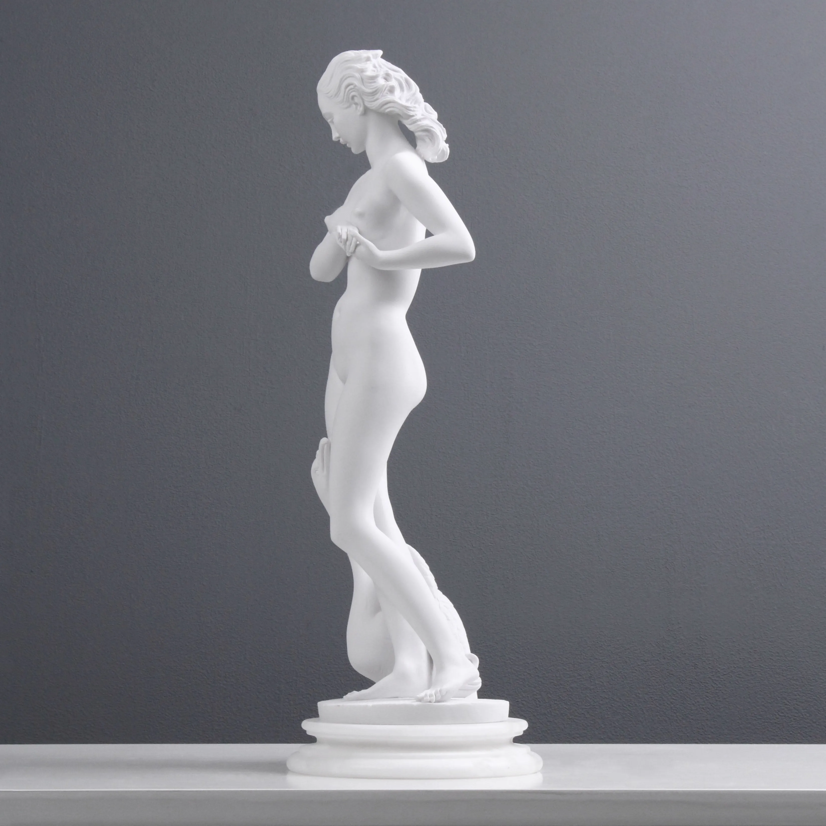 Young Lady with a Swan Statue